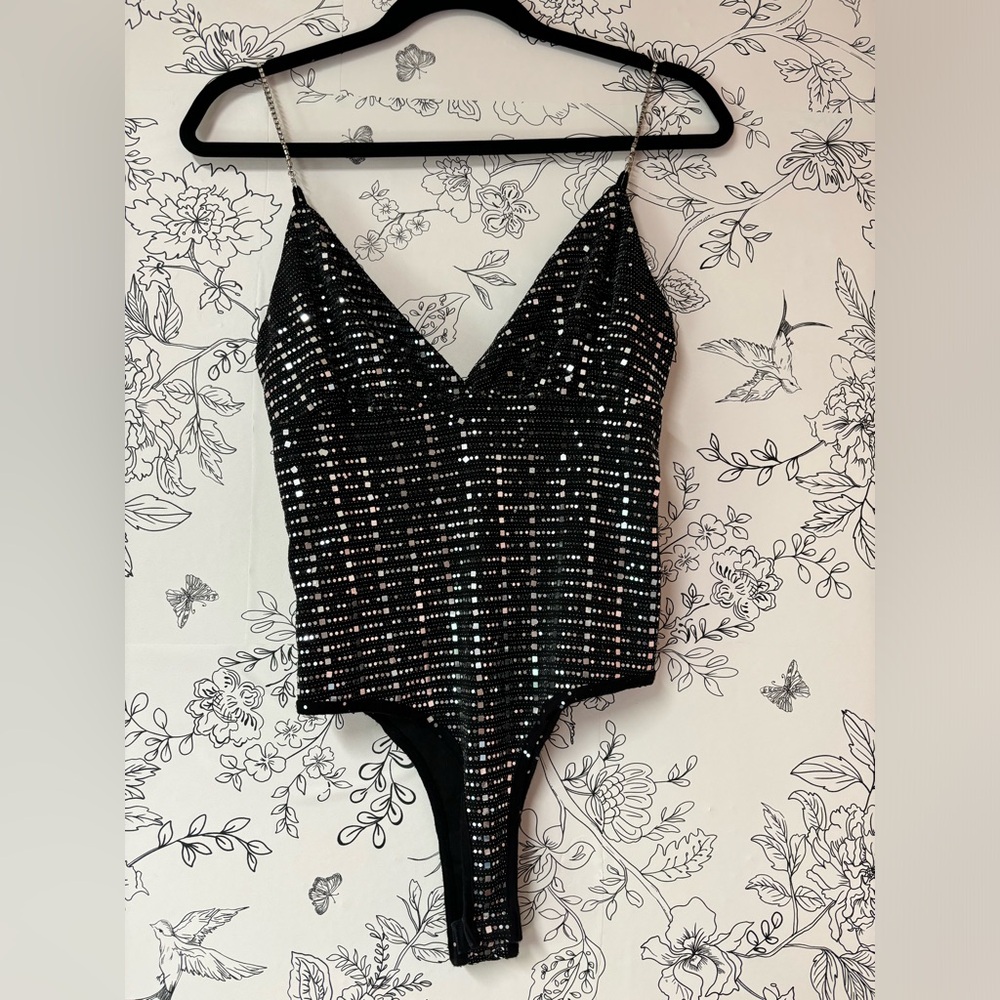 Cute black sequenced bodysuit